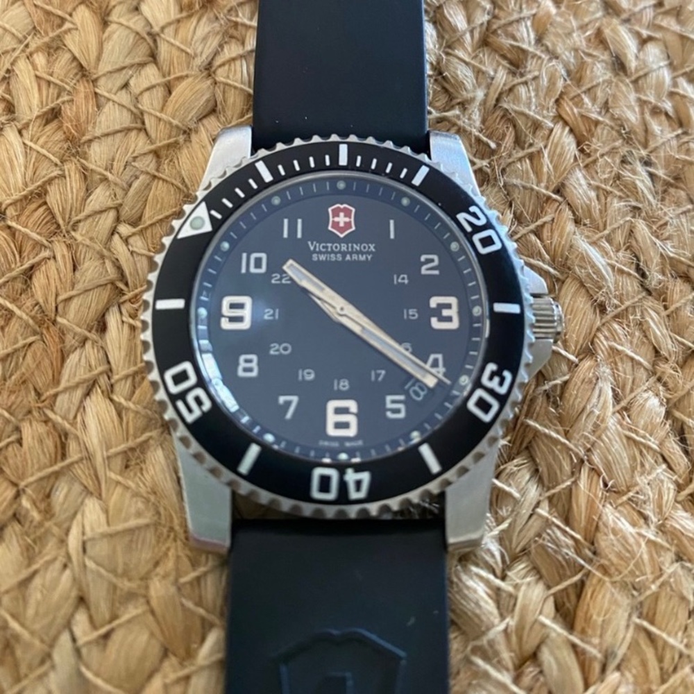 Victorianox Black Women’s watch. Rubber wrist band